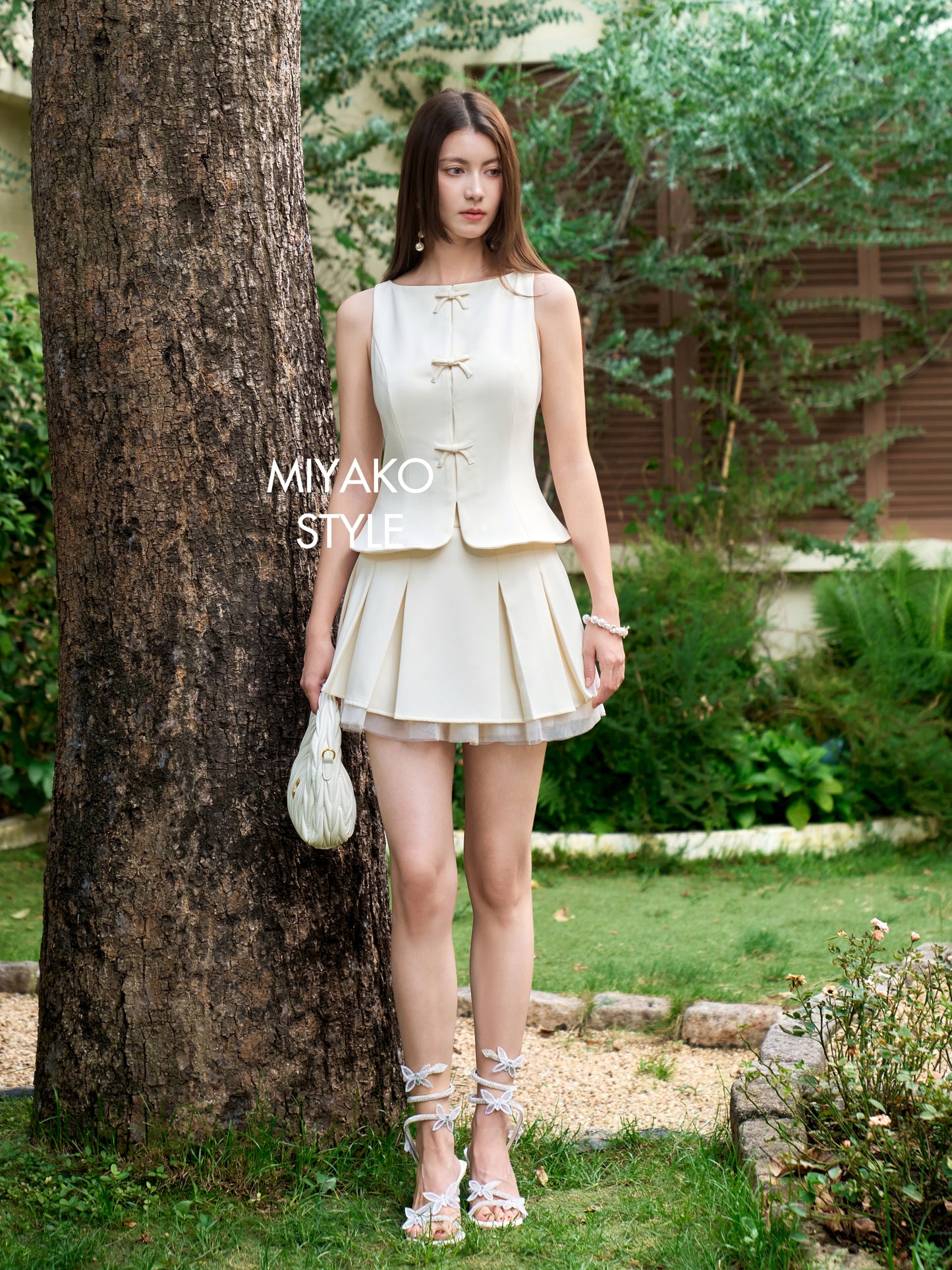 Miu Mini Skirt in Beige White