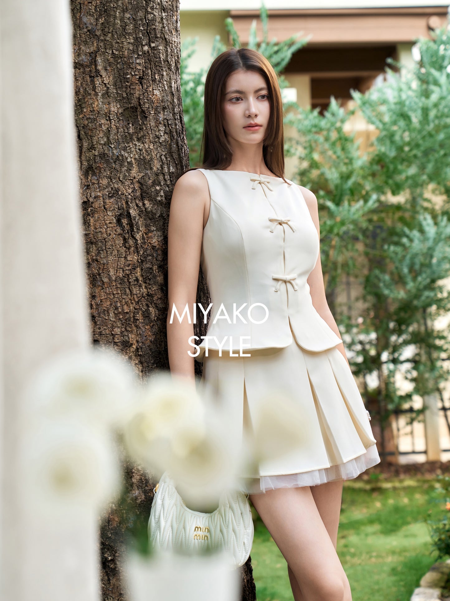 Miu Mini Skirt in Beige White